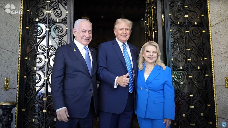 This still image taken from an Israeli Government Press Office video shows Israeli Prime Minister Benjamin Netanyahu (L) and his wife Sara (R) being welcomed by former US President Donald Trump at the Mar-a-Lago Club in Palm Beach, Florida, on 26 July, 2024